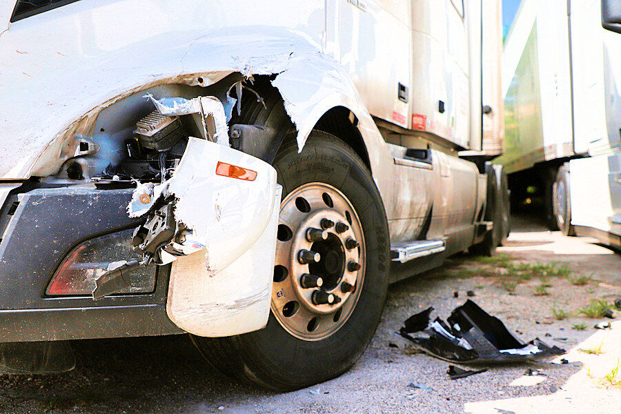 Physical Damage Insurance - Semi Truck with Damaged front Corner
